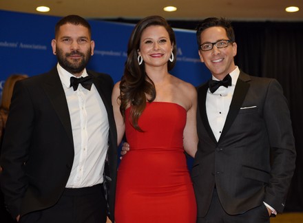 Guillermo D'az, Katie Lowes and.Dan Bucatinsky, of the ABC series Scandal, arrives on the red carpet at the White House Correspondents' Association Dinner at the Washington Hilton in Washington, DC on May 3, 2014.