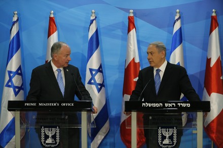 Israel's Prime Minister Netanyahu shakes hands with Canada's Foreign Minister Nicholson after their meeting in Jerusalem - 03 Jun 2015