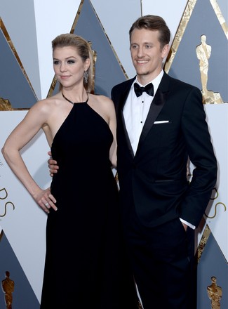 Nominees Courtney Marsh, left, and Jerry Franck arrive on the red carpet for the 88th Academy Awards, at the Hollywood and Highland Center in the Hollywood section of Los Angeles on February 28, 2016.
