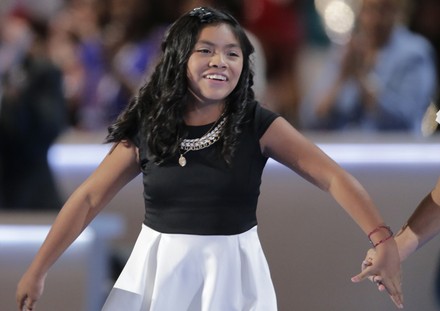Karla Ortiz, 11, smiles after speaking about immigration reform at the DNC convention in Philadelphia, Pennsylvania, United States - 25 Jul 2016