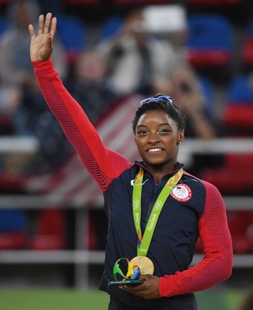 Simone Biles Waves Holding Her Gold Editorial Stock Photo - Stock Image ...