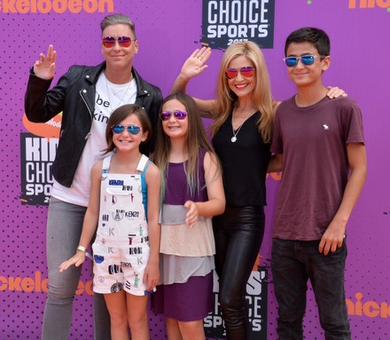 Former professional soccer player Abby Wambach (L) and her spouse, author Glennon Doyle Melton and guests attend Nickelodeon's Kids' Choice Sports Awards 2017 at UCLA's Pauley Pavilion in Los Angeles on July 13, 2017.