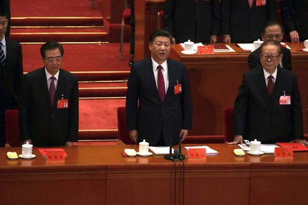 China's Xi, Hu and Jiang address delegates during the Comunist Party of China congress in Beijing, China - 24 Oct 2017