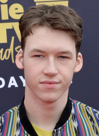Actor Devin Druid attends the MTV Movie & TV Awards at the Barker Hangar in Santa Monica, California on June 16, 2018. It will be the 27th edition of the awards, and the second to jointly honor movies and television. The show will tape on Saturday, June 16th and air on Monday, June 18th.
