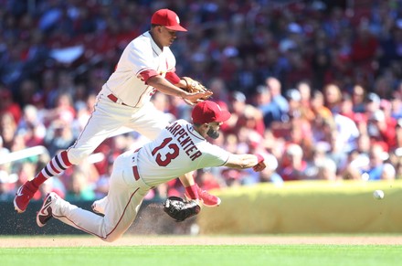 St. Louis Cardinals Patrick Wisdom (L) and Yairo Munoz rip the shirts from  the back of Tyler O'Neill after O'Neill hit a walk off home run against the  San Francisco Giants in