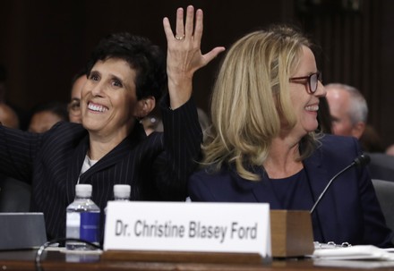 Professor Christine Blasey Ford smiles next to attorney Katz at conclusion of testimony before a Senate Judiciary Committee confirmation hearing on Capitol Hill in Washington, District of Columbia, United States - 27 Sep 2018