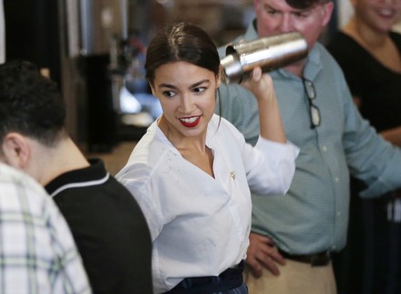 Alexandria Ocasio-Cortez Bartends In New York, Queens, United States ...