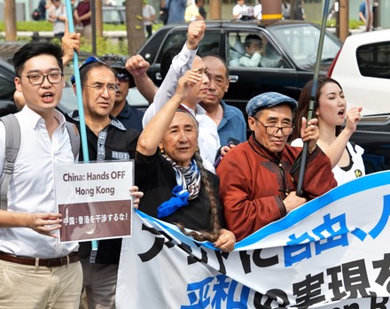 Protesters hold a rally against China government in Osaka, Japan - 29 Jun 2019