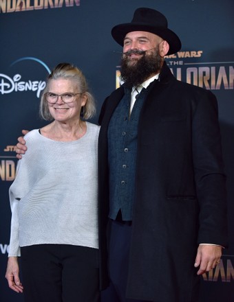 Tait Fletcher (R) arrives for the premiere of Disney+'s 'The Mandalorian' at the El Capitan Theatre in Los Angeles, California on Wednesday, November 13, 2019.