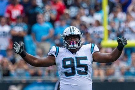 Carolina Panthers defensive tackle Derrick Brown (95) wears a