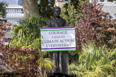 Millicent Fawcett statue green bombed by activists, London, UK - 22 Sep 2021
