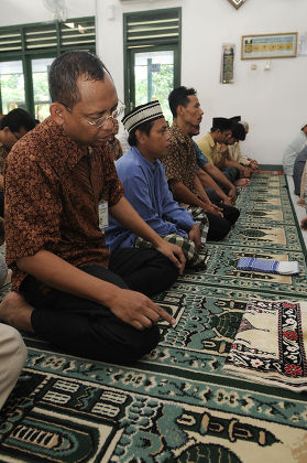 President Obama's cousin Haryo Sotendro praying at his local mosque in Jakarta, Indonesia - 12 Mar 2010
