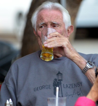 Exclusive - George Lazenby wearing a shirt with a James Bond logo and his name on it, Santa Monica, Los Angeles, California, USA - 27 Sep 2021
