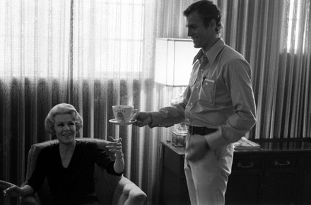 Man Giving Julia Jean Turner Coffee Editorial Stock Photo - Stock Image