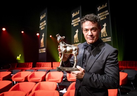 Fedja van Huet poses with his Golden Calf (Gouden Kalf) award for Best Leading Role in 'De Ververdeling' (The Judgement) after the presentation of the Grolsch Golden Calf Gala during the 41st edition of the Netherlands Film Festival (NFF), in Utrecht, Netherlands, 01 October 2021.