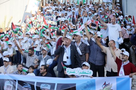 Palestinians take part in a march marking the 10th anniversary of prisoners swap deal between Hamas and Israel, in Gaza city, Gaza city, Gaza Strip, Palestinian Territory - 18 Oct 2021