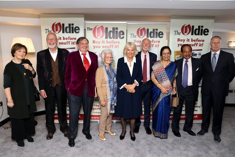 Winners of the Oldie Awards 2021 pose with Camilla Duchess of Cornwall (C), (L-R) Dame Delia Smith, 'Whispering' Bob Harris, Barry Humphries, Margaret Seaman, Roger McGough, Dr Saroj Datta, Dr Mridul Kumar Datta and Sir Geoff Hurst
