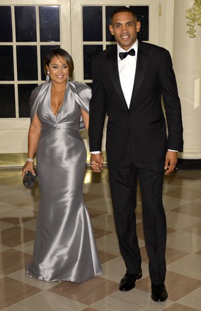 Former NBA basketball player Grant Hill (R) and his wife Tamia arrive at the White House for the State Dinner for Canada's Prime Minister Justin Trudeau and First Lady Sophie Gregorie Trudeau, March 10, 2016 in Washington, DC. The dinner, as part of an Official Visit, highlights the long standing friendship, alliance and cooperation between the United States and Canada .