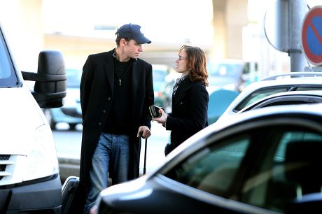 Martina Hingis with husband Thibault Hutin at Roissy airport in Paris, France - 12 Dec 2010