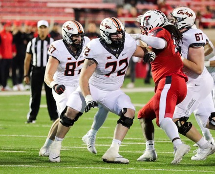 Oklahoma State offensive lineman Josh Sills (72) and Oklahoma