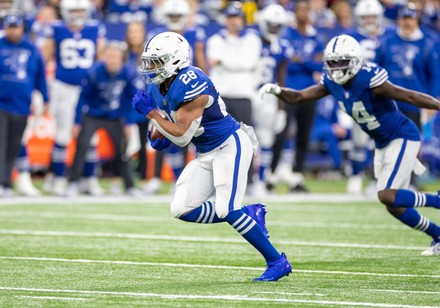 November 28, 2021: Indianapolis Colts running back Jonathan Taylor (28)  runs with the ball during NFL football game action between the Tampa Bay  Buccaneers and the Indianapolis Colts at Lucas Oil Stadium