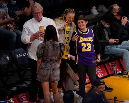 Jojo Siwa, Jenna Johnson and Val Chmerkovskiy watch the Los Angeles Lakers v Orlando Magic game, Basketball, Staples Center, Los Angeles, California, USA - 12 Dec 2021