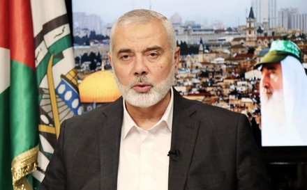 Head of the Hamas political bureau, Ismail Haniyeh speaks during a video statement marking the 34th anniversary of the founding of the Hamas movement, Doha, Qatar - 14 Dec 2021