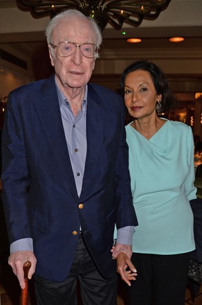 Dame Joan Collins with Sir Michael Caine and family at Langan's Brasserie, London, UK - 15 Dec 2021
