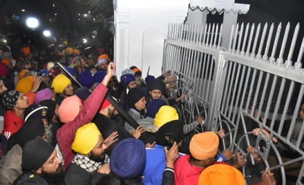Man Beaten To Death After Alleged Sacrilege Attempt At Golden Temple, Amritsar, Punjab, India - 18 Dec 2021