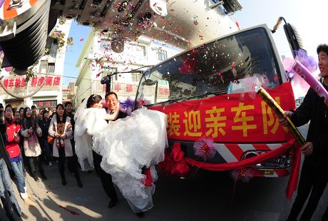 Former Crane Driver Organises 11 Cranes for His Wedding Day Parade, Xi'an, Shaanxi Province, China - 21 Dec 2010