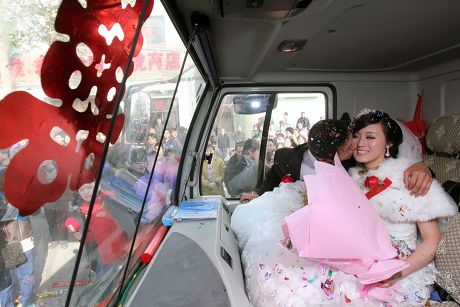 Former Crane Driver Organises 11 Cranes for His Wedding Day Parade, Xi'an, Shaanxi Province, China - 21 Dec 2010
