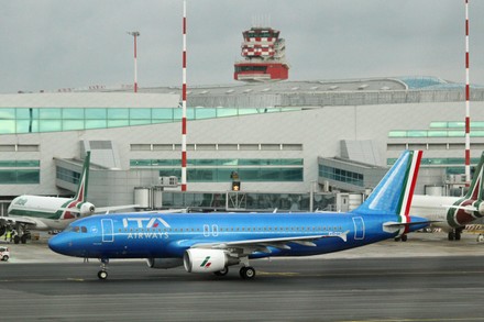 ITA Airways plane with new blue livery in first Rome-Milan flight on Christmas Eve, Fiumicino Rome, Italy - 24 Dec 2021