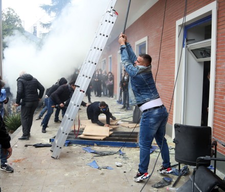 Protesters storm Albania's Democratic Party office in Tirana - 08 Jan 2022