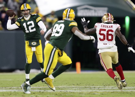 Green Bay, United States. 23rd Jan, 2022. San Francisco 49ers George Kittle  (85) makes a catch in front of Green Bay Packers Preston Smith (91) in the  second half of the NFC