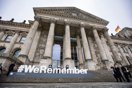Action #WeRemember in front of the German Parliament, Berlin, Germany - 25 Jan 2022