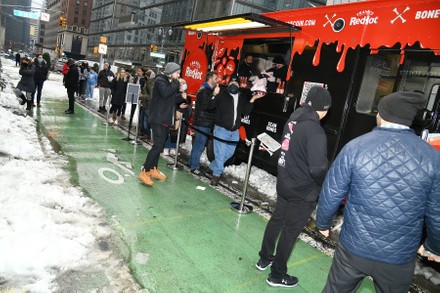Eli Manning Serves New Yorker's Wings at Frank's Red Hot Wing Wagon, New York, USA - 02 Feb 2022
