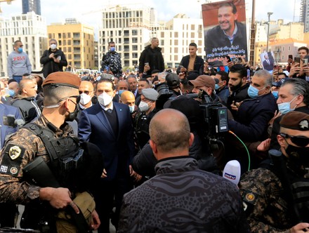 Lebanon's former premier Saad Hariri greets his supporters after visiting the gravesite of his father, slain prime minister Rafiq Hariri, in downtown Beirut, Beirut, Lebanon - 14 Feb 2022