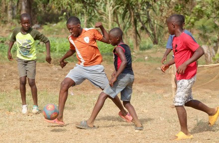 Liberian Boys Play Soccer On Dusty Editorial Stock Photo - Stock Image 