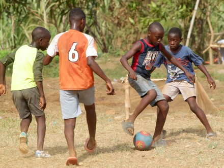 LIBERIAN BOYS PLAY SOCCER ON DUSTY Editorial Stock Photo - Stock Image ...