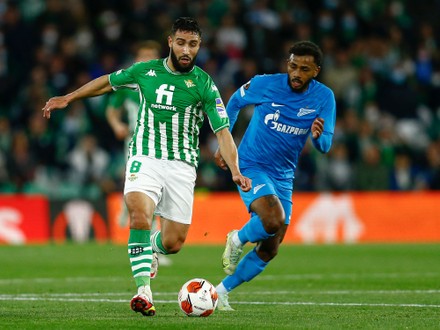 Guido Rodriguez of Real Betis and Tokmac Chol Nguen of Ferencvaros during  the UEFA Europa League match between Real Betis and Ferencvaros TC played  at Benito Villamarin Stadium on November 25, 2021