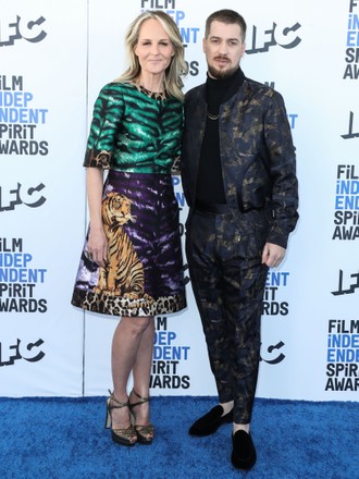 Helen Hunt and Rafael Casal arrive at the 2022 Film Independent Spirit Awards held at the Santa Monica Beach on March 6, 2022 in Santa Monica, Los Angeles, California, United States.