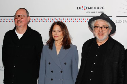 French musician and composer Andre Dziezuk (L), Palestinian film director Elia Suleiman (R) and Canadian actress Suzanne Clement (C) arrive to the final ceremony of the 12th edition of Luxembourg Film Festival at Kinepolis in Luxembourg, 12 March 2022. The 12th edition of the film festival is running from 03 to 13 March 2022.