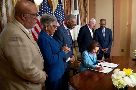 Speaker Pelosi holds bill enrollment for H.R. 55 the Emmett Till Antilynching Act, Washington, Usa - 16 Mar 2022