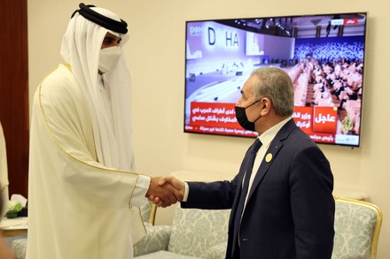 Palestinian Prime Minister Mohammed Ishtayeh meets with Qatari Emir Sheikh Tamim bin Hamad al-Thani, in Doha, Qatar, Doha, Qatar - 26 Mar 2022