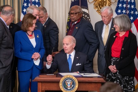 US President Joe Biden signsH.R. 3076, the Postal Service Reform Act of 2022, Washington, District of Columbia, USA - 06 Apr 2022