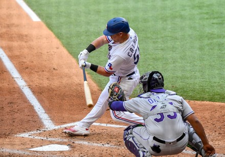 Apr 11, 2022: Texas Rangers right fielder Kole Calhoun #56 flies out in the  bottom of the second inning during an Opening Day MLB game between the  Colorado Rockies and the Texas