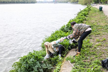 Aimee Fuller and Katya Jones clean up the River Thames pathway for World Earth Day, London, UK - 22 Apr 2022
