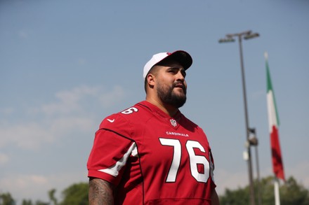 Arizona Cardinals guard Will Hernandez (76) wears a Mexico flag