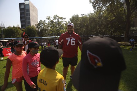 Arizona Cardinals guard Will Hernandez (76) wears a Mexico flag