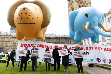 Elephant and Lion Balloons float outside Parliament in Support of the Animal Protection Bill in London, UK - 27 Apr 2022